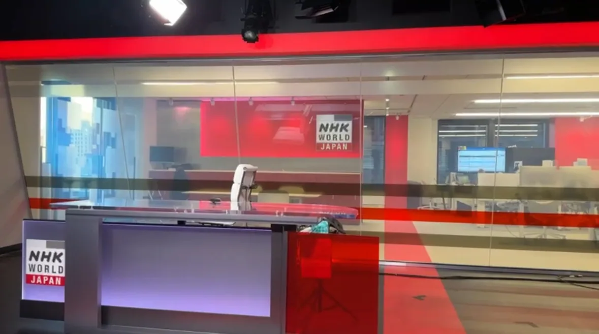 The NHK World-Japan newsroom behind switchable film