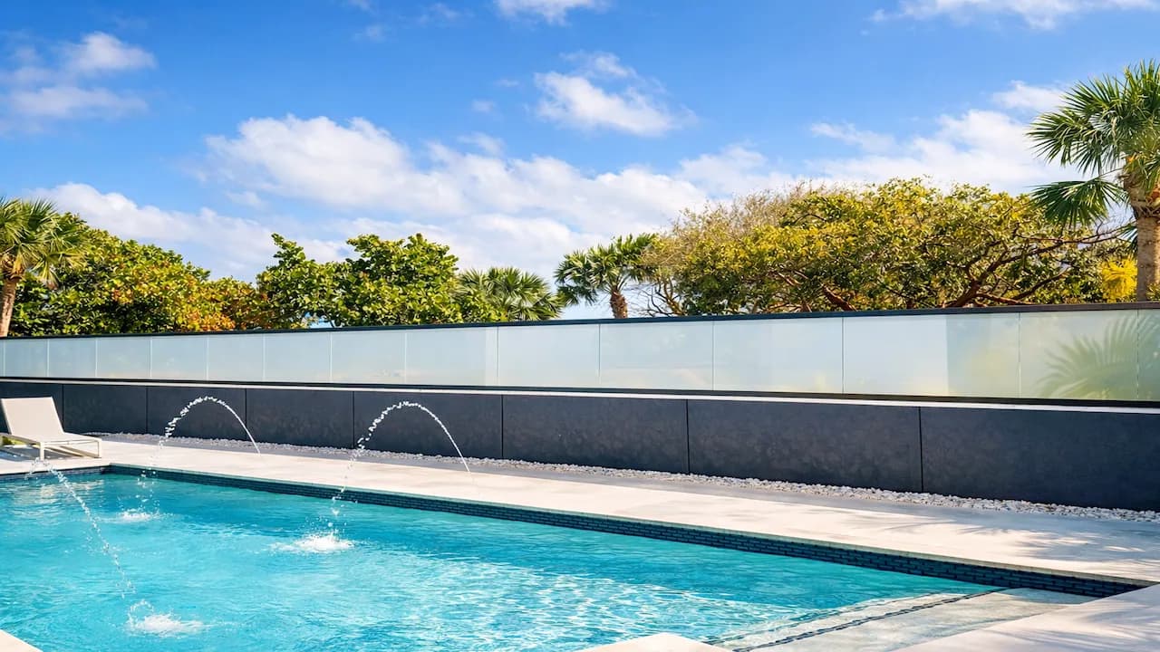 PriWatt smart glass pool railing at a North Palm Beach residence