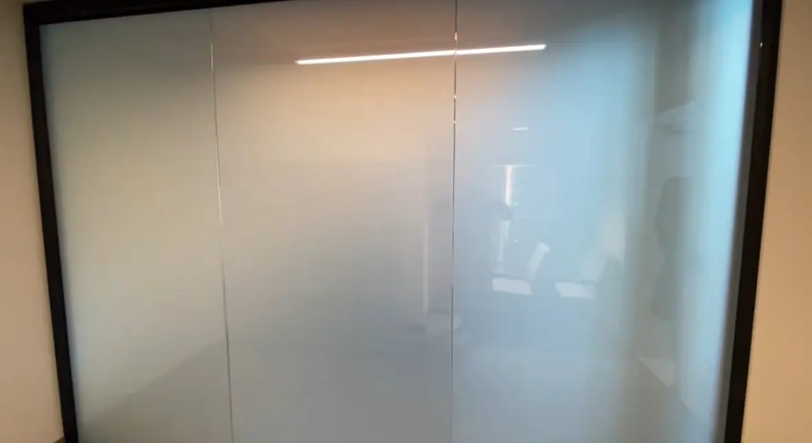 A glazed office at Bank of Southern California with the switchable glass clear