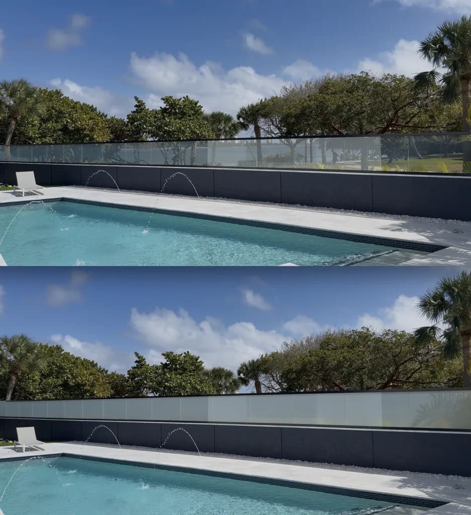 PriWatt reverse smart glass railing along a pool terrace in North Palm Beach
