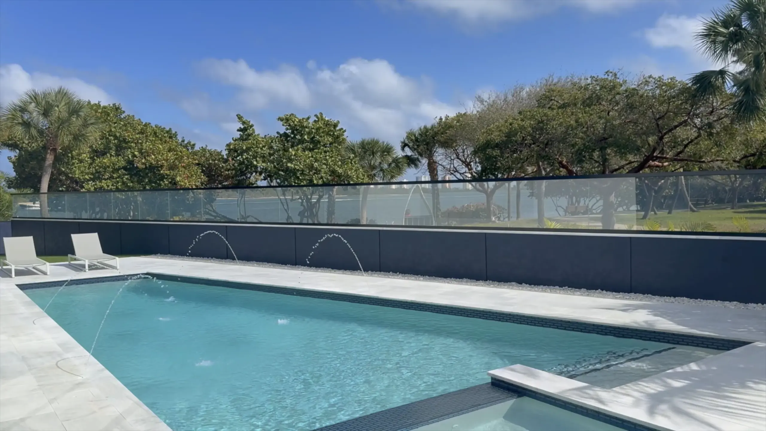 Poolside PriWatt smart glass railing switched to privacy mode