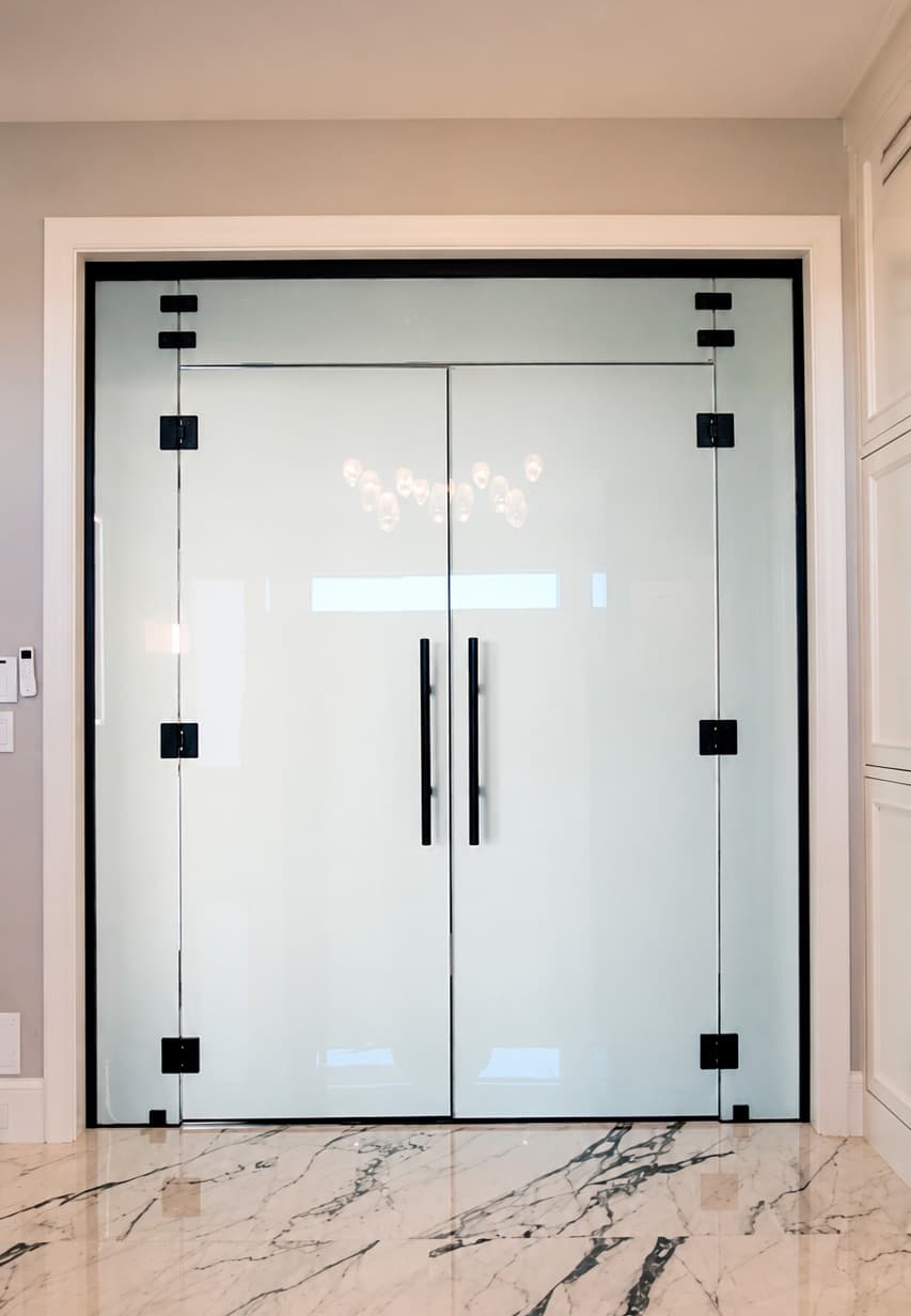 Interior double doors glazed with PriWatt switchable glass, switched private