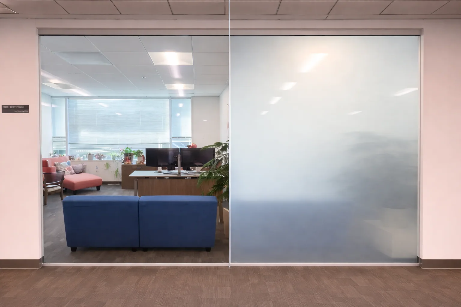 A Summerwood office partition in PriWatt smart glass, switched to privacy
