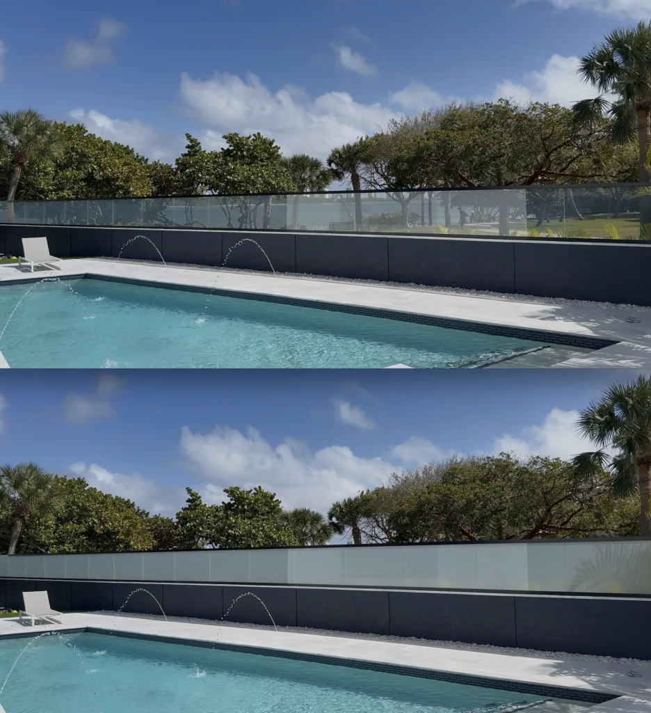 PriWatt reverse smart glass railing along a pool terrace in North Palm Beach