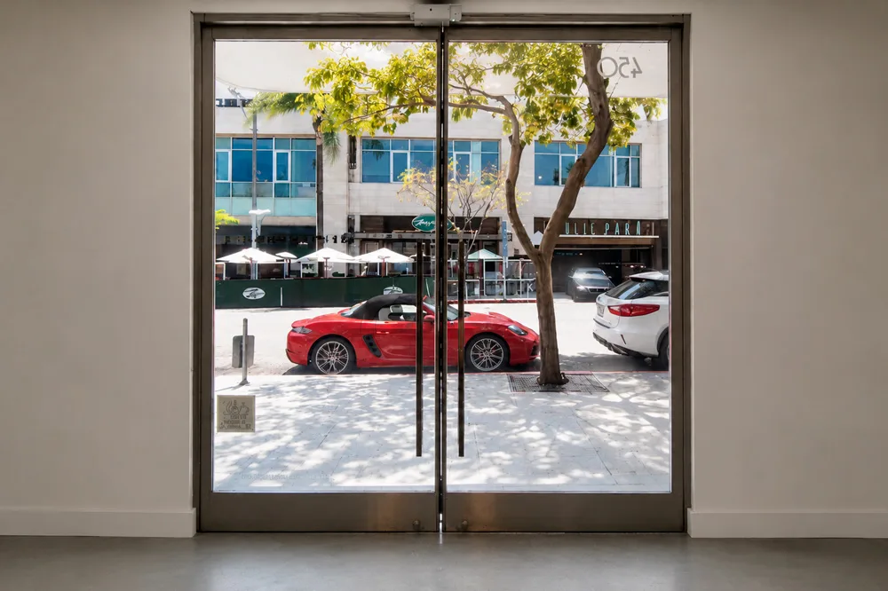 The same retail entrance doors switched to transparent