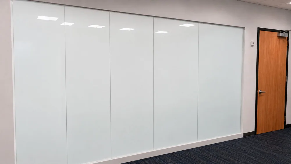 Training room wall with PriWatt smart glass in privacy mode