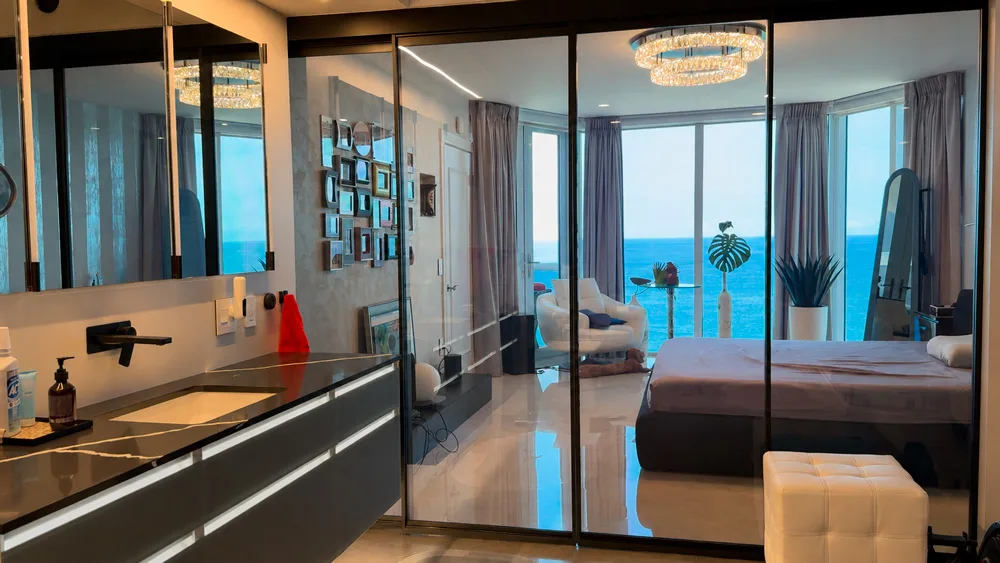 The same hotel suite partition switched to transparent