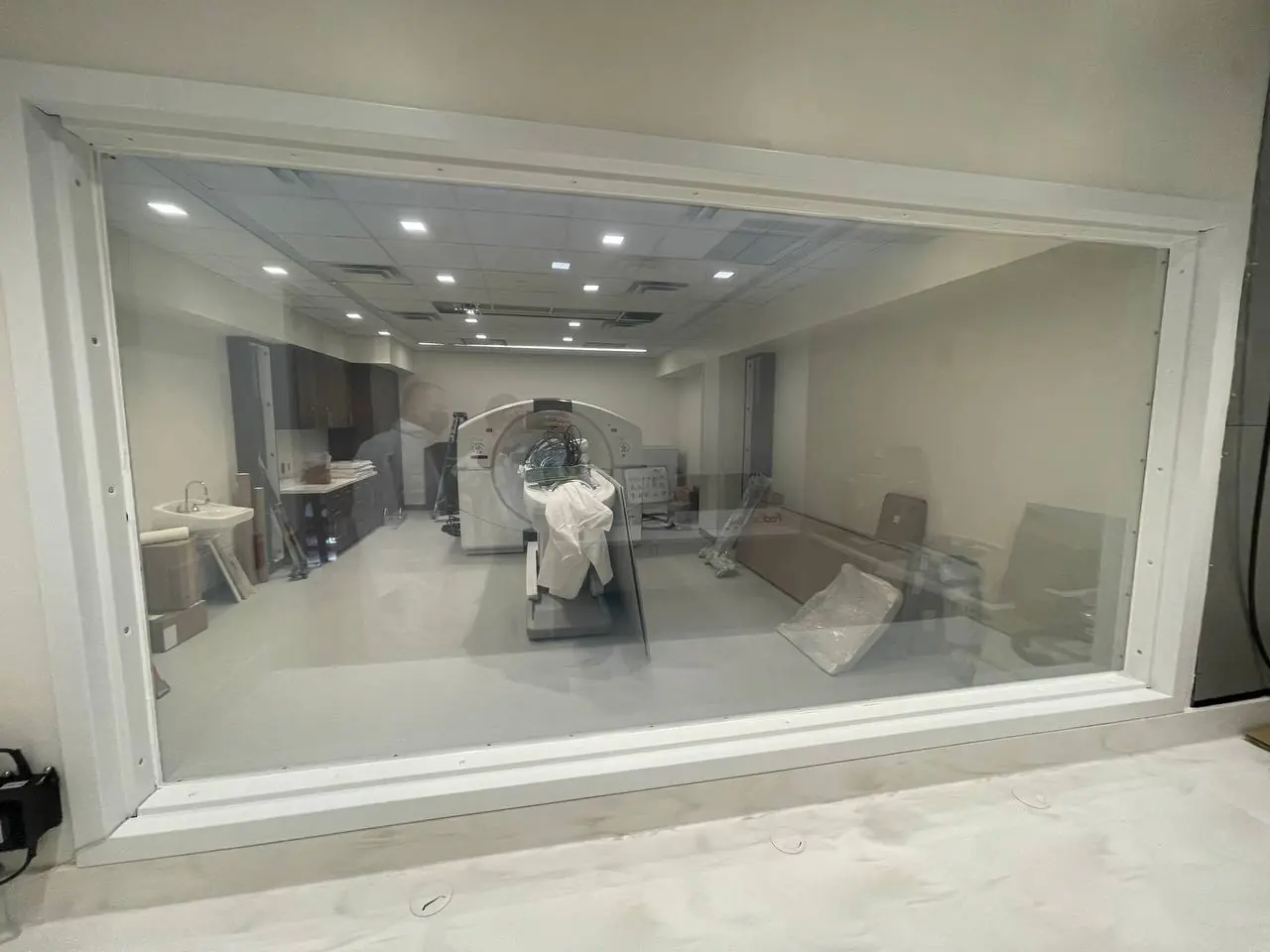 The control-room window of the MRI suite with the switchable film clear