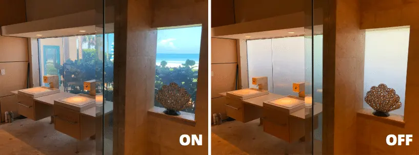 The bathroom windows in their clear state, with the ocean beyond